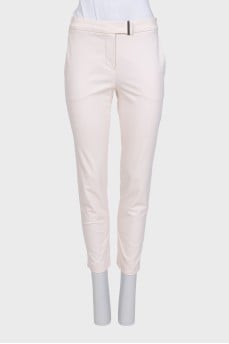 Tapered trousers with a zipper and button