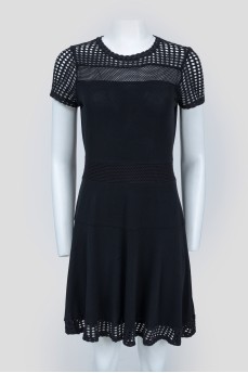 Black dress with perforated inserts