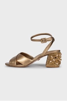 Gold-color leather sandals decorated with crystals