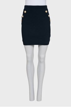 Blue skirt with gold buttons