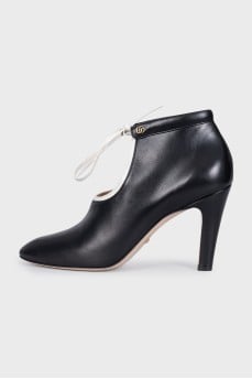 Black leather ankle boots with laces
