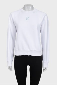 White sweatshirt with a print