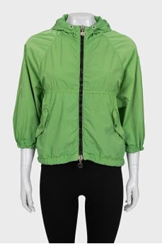 Green windbreaker with short sleeves