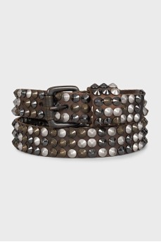 Leather belt decorated with spikes