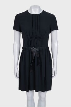 Black fitted dress with a zipper