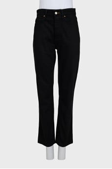 Black straight-leg jeans with pockets