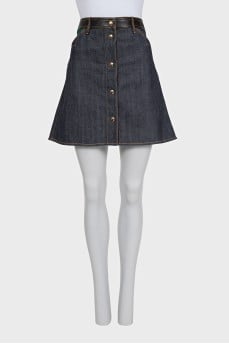 Denim skirt with leather inserts and buttons
