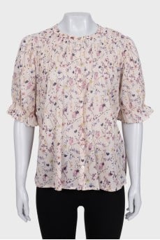 Beige blouse with floral print