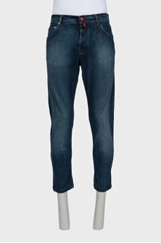 Men's blue jeans with bright buttons