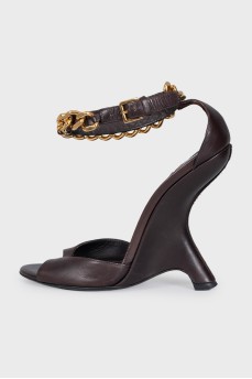 Leather sandals with a shaped wedge heel