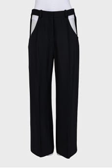 Black straight-leg trousers with cutouts