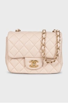 Beige leather crossbody bag with strap