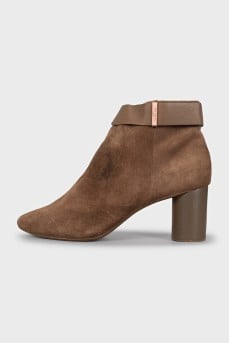 Brown suede ankle boots with a zipper