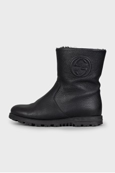 Black leather boots with fur