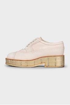 Leather derby shoes with gold soles