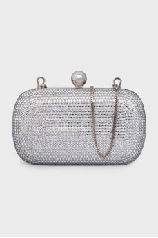 Clutch on a chain decorated with crystals