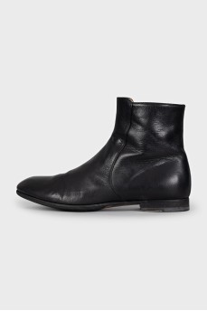 Men's black leather boots with a zipper