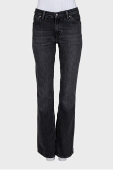 Black flared jeans with patch pockets