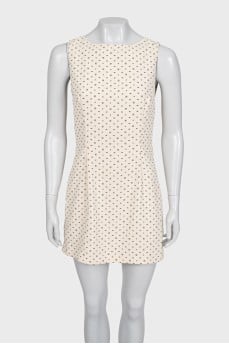 Beige fitted dress with a small print