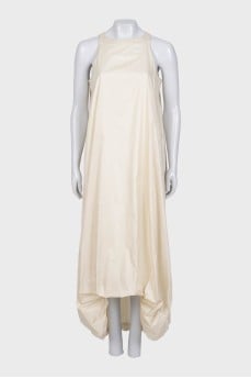 Loose dress with an asymmetrical hem
