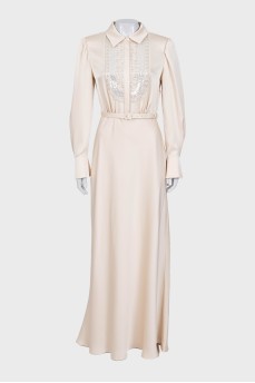 Beige dress with decoration and tag