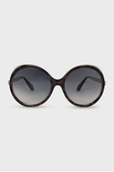 Grand sunglasses with a combined frame