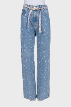 Blue jeans with a distressed effect