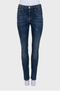 Blue jeans with a ripped effect