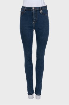 Blue skinny jeans with embellishments