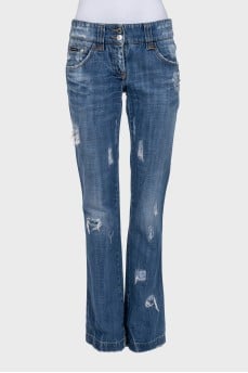 Blue distressed flared jeans