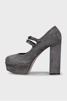 Suede platform shoes with embellished heels