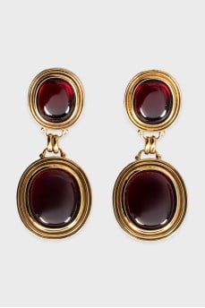 Gold earrings with massive pendants