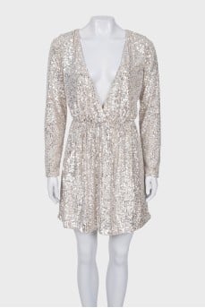 Dress with a cutout decorated with sequins