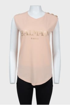Top with gold brand logo print on the front