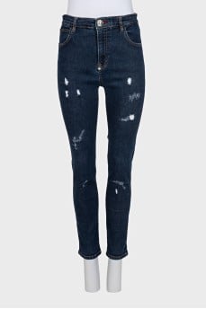 High rise skinny jeans with distressing