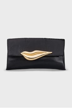 Leather clutch with a shaped clasp
