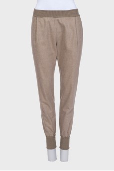 Brown tapered trousers with elastic waistband