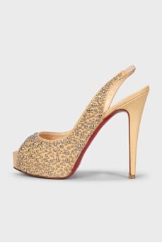 Patent leather slingbacks with decoration