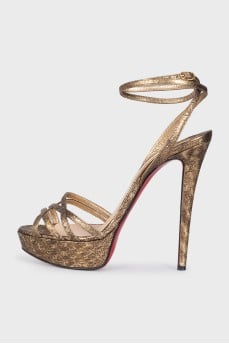 Leather sandals with heels and a high platform