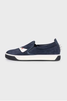 Men's suede slip-ons decorated with studs
