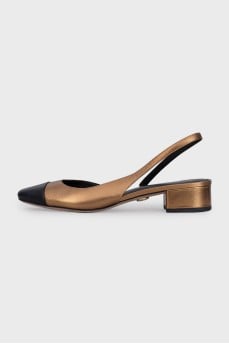 Gold slingbacks with contrast toe