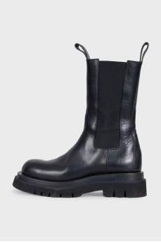 Black leather high boots