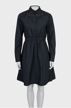 Black dress with decorative perforations