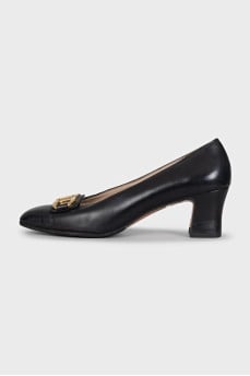 Leather high heels with signature embellishments