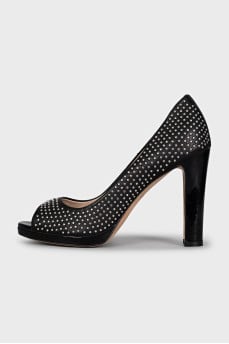 Black leather high heels with embellishments