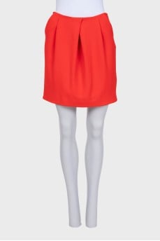 Orange skirt with patch pockets