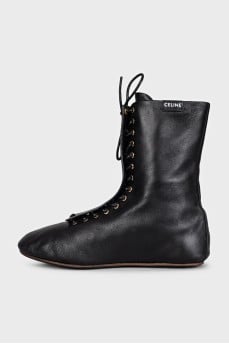 Black leather boots with logo