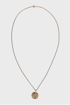 Silver pendant with a medallion