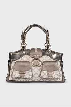 A bag with a signature print and patch pockets