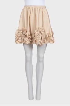 Beige skirt decorated with flounces